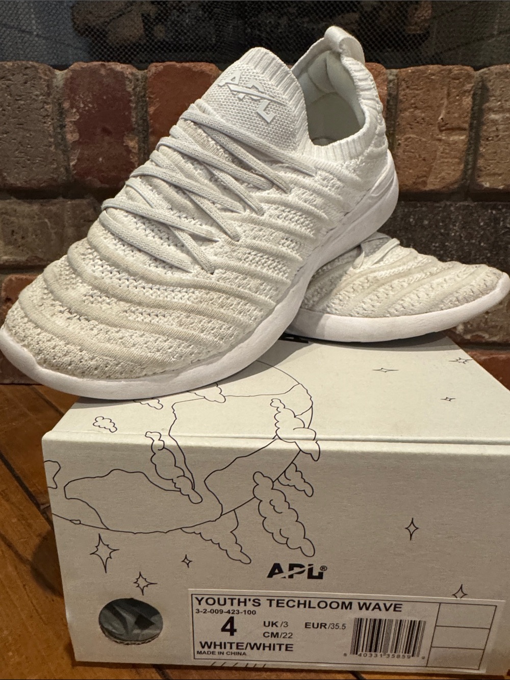 Gently loved APL Youth Size 4 White Techloom Wave Knit Slip-On Sneakers w/box